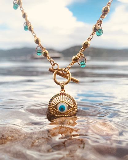 Handmade Aura Evil Eye Necklace with a toggle lock. 10k Gold filled chains and pendant. Made by Stoneriver Philippines by Kim Sabala.