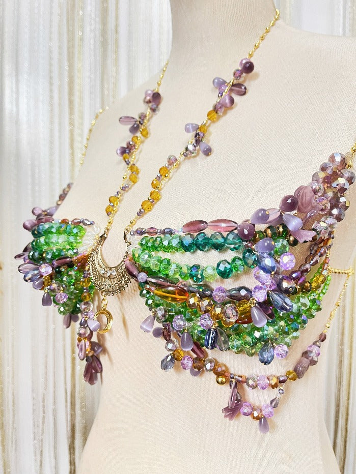 Made in the Philippines ✶ Shipping Worldwide ✶ Mesmerize in this extra special body piece from Kim Sabala, featured in a corset-inspired design with underbust adornments for an ultra-flattering look. Features amber stones, lilac cat eye stones, citrine stones, glass crystals strung on 18k gold filled chains.