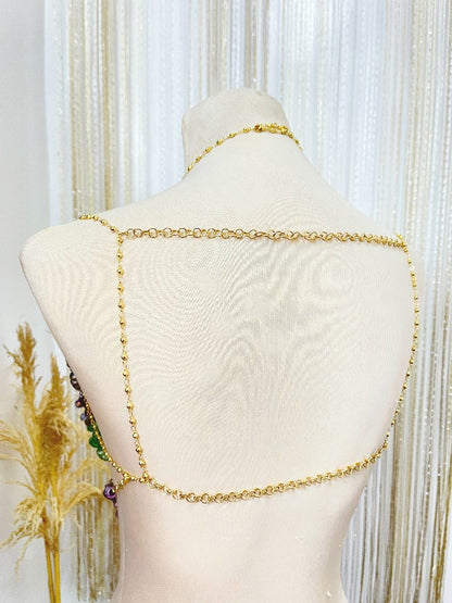 Made in the Philippines ✶ Shipping Worldwide ✶ Mesmerize in this extra special body piece from Kim Sabala, featured in a corset-inspired design with underbust adornments for an ultra-flattering look. Features amber stones, lilac cat eye stones, citrine stones, glass crystals strung on 18k gold filled chains.